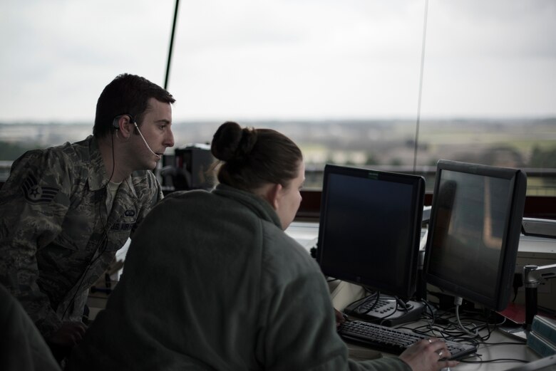 Airmen from the 48th Operations Support Squadron air traffic control tower prepares for F-15s to land at Royal Air Force Lakenheath, England, Feb. 6, 2017. The tower consists of several positions including ground control, flight data, coordinator, local control and watch supervisor. (U.S. Air Force photo/Senior Airman Malcolm Mayfield)