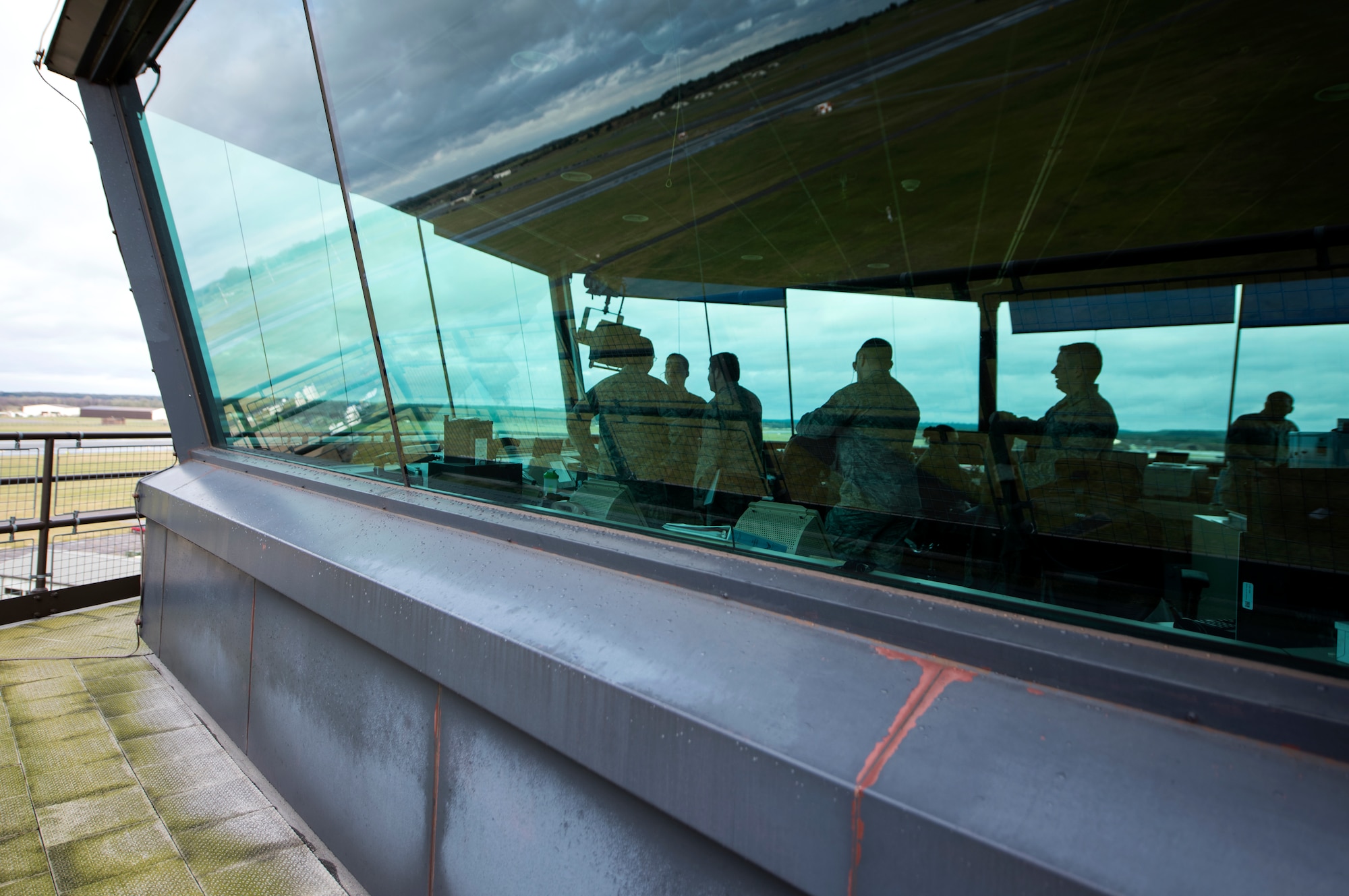 Airmen from the 48th Operations Support Squadron stand vigilant in the air traffic control tower Royal Air Force Lakenheath, England, Feb. 9, 2017. The tower consists of several positions including ground control, flight data, coordinator, local control and watch supervisor. (U.S. Air Force photo/Senior Airman Malcolm Mayfield)