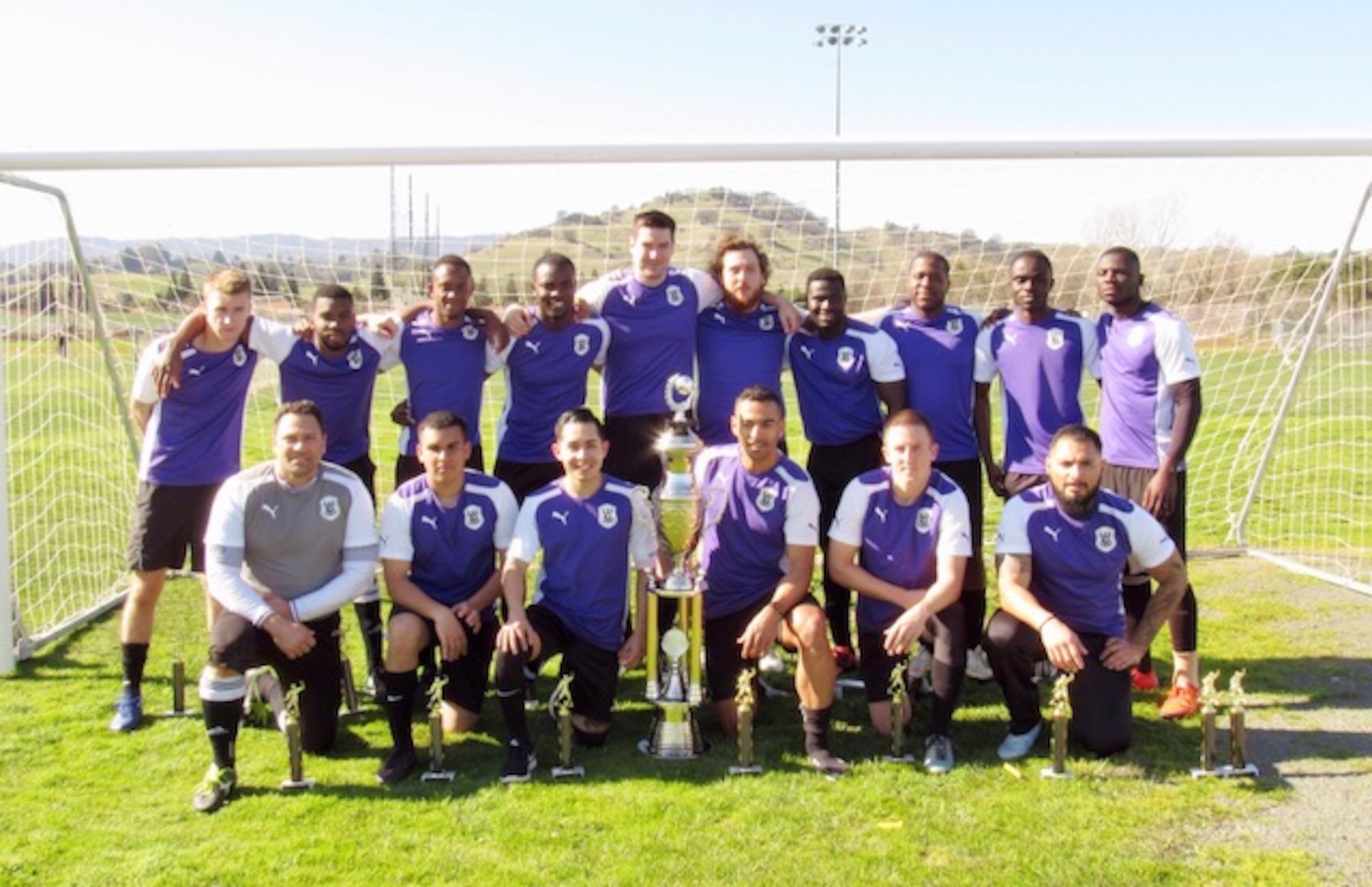 Members of the Travis Football Club soccer team pose for a photo after wining the Fairfield, Calif., Soccer League champions for the first time over Real Madrid in extra time, Feb. 4. The teams were tied 4-4 after 90 minutes of regular time. The deadlock continued with the teams tied 5-5 after extra time, sending them to a shootout.The teams matched each other shot for shot until the eighth penalty kick where the Travis FC keeper blocked the shot, leading to Travis FC’s win. (Courtesy Photo)