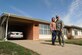 Airman 1st Class Aaron Vang and spouse, Celina Vang, pose in front of their residence at Laughlin Air Force Base, Feb. 7, 2017. Laughlin Family Housing has recently reached 99 percent occupancy and are determined to deliver the best customer service to residents.