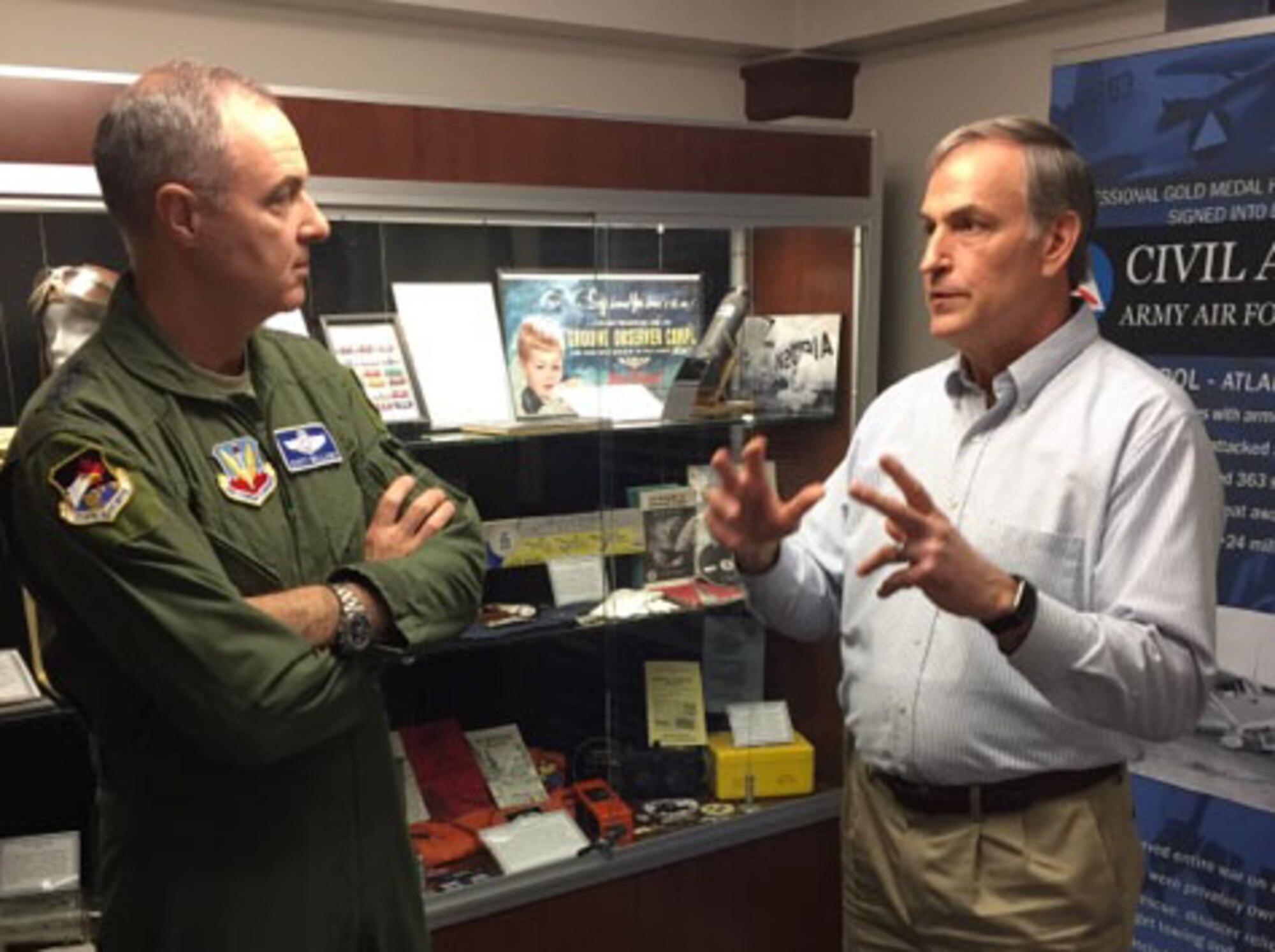 MAXWELL AIR FORCE BASE, Ala. - Lt. Gen. R. Scott Williams, Commander, Continental NORAD Region- 1st Air Force (Air Forces Northern), listens as John Salvador, Chief Operating Officer, Civil Air Patrol – U.S. Air Force National Headquarters, talks about the organization’s mission during Williams’ visit to the headquarters Feb. 7.  (Air Force photo by Capt. Emily Meredith)
