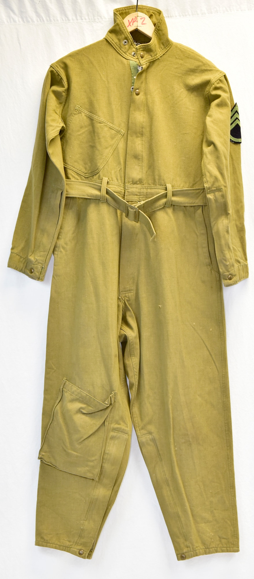 Plans call for this artifact to be displayed near the B-17F Memphis Belle™ as part of the new strategic bombardment exhibit in the WWII Gallery, which opens to the public on May 17, 2018. Flight suit worn by Memphis Belle waist gunner SSgt William “Bill” Winchell. Winchell was credited with downing an Fw 190 fighter.