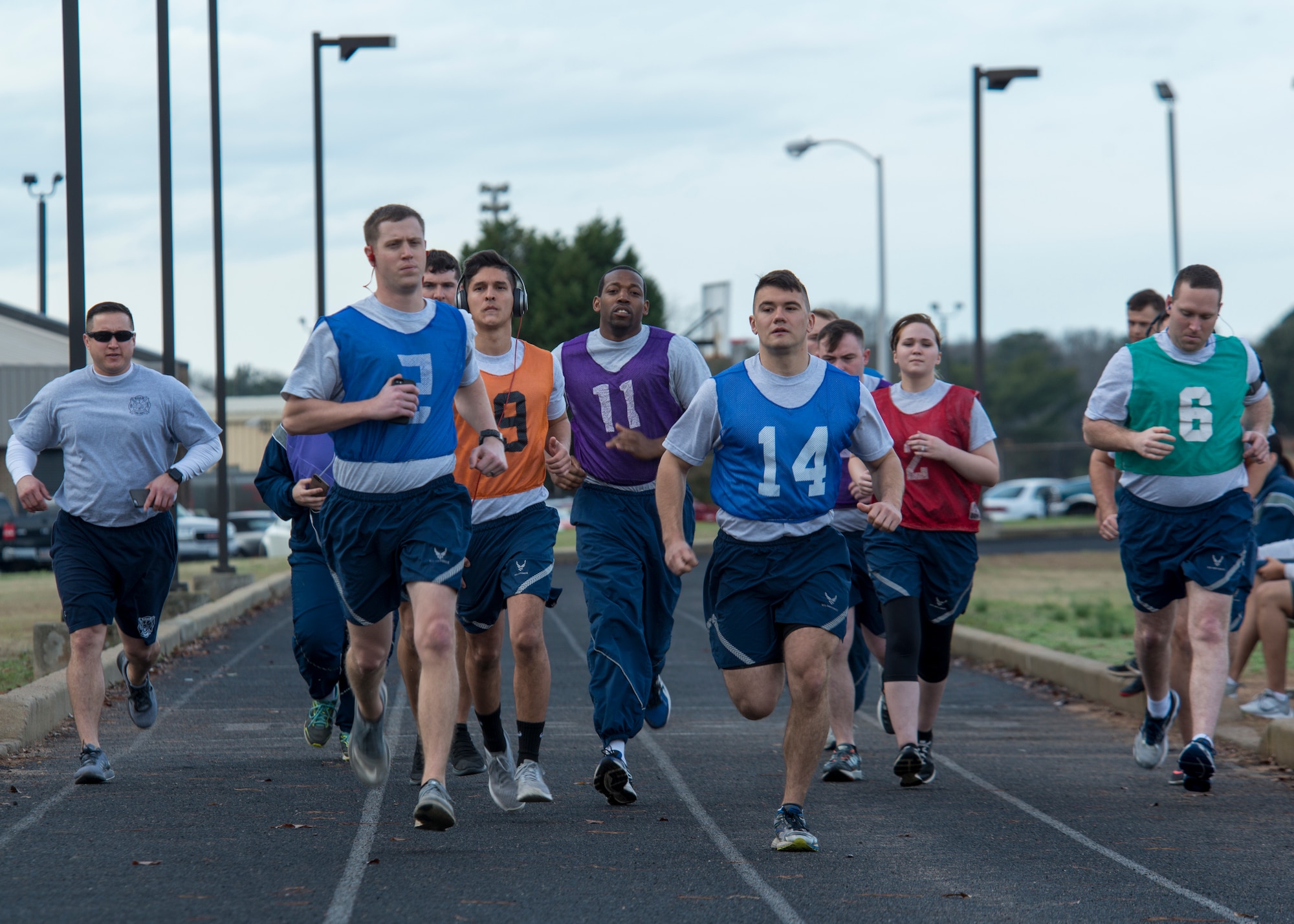 U.S. Airmen begin a timed 1.5 mile run at the track at Shaw Air Force Base, S.C., Feb. 12, 2018.