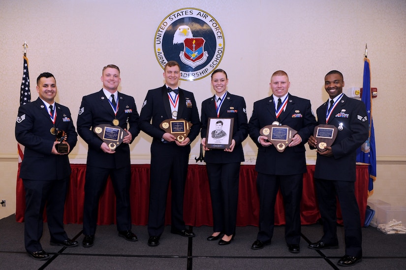 During the Airman Leadership School Graduation Ceremony at Joint Base Charleston, S.C., several Airmen received awards Feb. 8, 2018. Staff Sgt. McClelland Shaw, left, 628th Force Support Squadron received the commandant award.
Staff Sgt. Bryan Thacker, second left, 628th Civil Engineer Squadron, received the Distinguished Graduate award. 
Staff Sgt. Cory Dye, 14th Airlift Squadron, third to left, received the Distinguished Graduate award.
Senior Airman Allyson Walker-Cramer, third to right, 628th Civil Engineer Squadron, received the Levitow Award. Staff Sgt. Garrett Thacker, second to right, 628th Civil Engineer Squadron, received the Distinguished Graduate award.
Senior Airman Robert Hubrins, right, 628th Security Forces Squadron, received the Academic Achievement award.