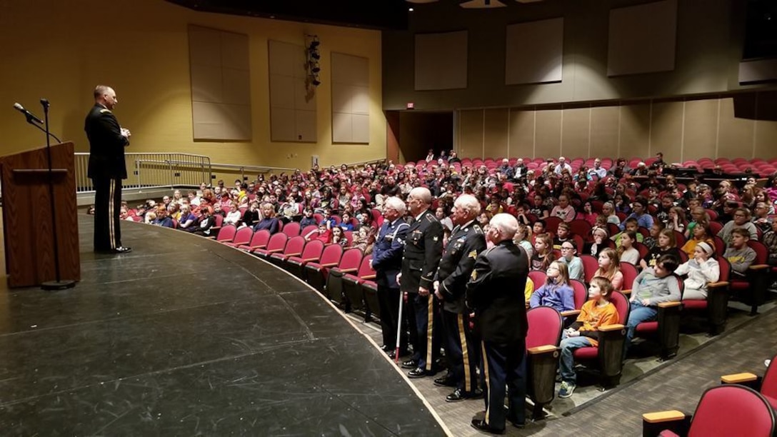 Major Gen. Patrick Reinert, 88th Readiness Division commanding general, visits Three Rivers Educational Campus and speaks with students from Taylor Middle School following a ceremony honoring the 245th birthday of our 9th President, William Henry Harrison, Feb. 9, in North Bend, Ohio.