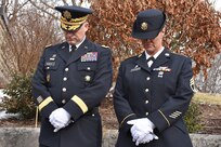 Major Gen. Patrick Reinert, 88th Readiness Division commanding general, and Staff Sgt. Jill Spencer, 88th RD executive assistant, bow their heads during a ceremony honoring the 245th birthday of our 9th President, William Henry Harrison, Feb. 9, in North Bend, Ohio.