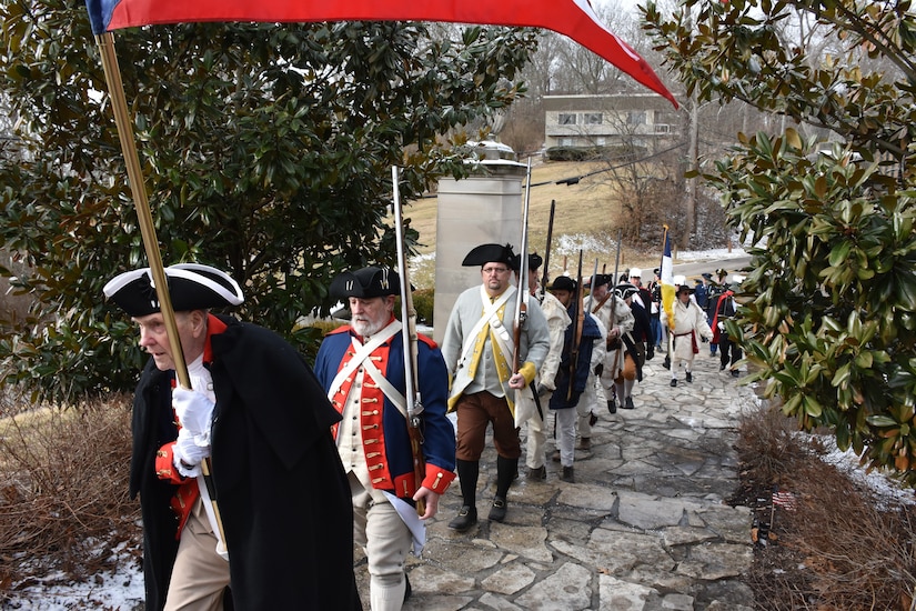 A procession of Soldiers and service members past and present, along with relatives, local officials and citizens in 18th century uniforms and attire, march through the Village of North Bend, Ohio, to the tomb of William Henry Harrison, Feb. 9, to honor our 9th President's 245th birthday.