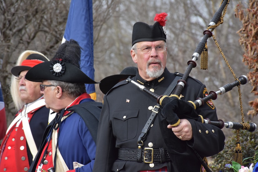 A bagpipe player prepares to play a ceremony honoring the 245th birthday of our 9th President, William Henry Harrison, Feb. 9, in North Bend, Ohio.