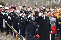 Local officials and retired U.S. Army Soldiers salute for a ceremony honoring the 245th birthday of our 9th President, William Henry Harrison, Feb. 9, in North Bend, Ohio.