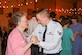 Airman First Class Austyn Salyers, 75th Air Base Wing Communications and Information Directorate, dances with a resident of Chancellor Gardens Senior Living Center in Clearfield Feb. 13 at the Valentines Dance. More than 60 residents attended and mingled with Team Hill guests. Staff members noted that the Team Hill Airmen are "always the highlight of the event." (U.S. Air Force photo by Jen Eaton)