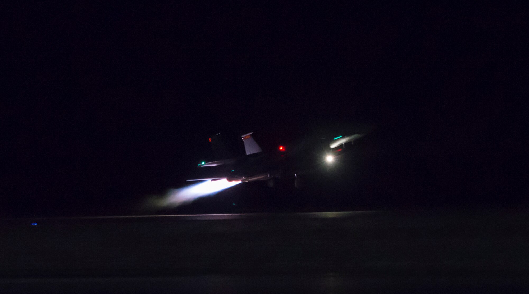Image of an F-15E Strike Eagle taking off during an exercise, Feb. 8, 2018, at Mountain Home Air Force Base, Idaho. The exercise focused on training for potential real world contingencies. (U.S. Air Force photo by Airman 1st Class Jeremy D. Wolff)