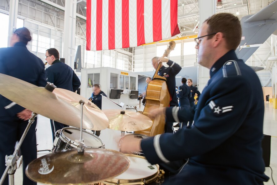 The USAF Band of the Golden West, perform during the 75th Anniversary kickoff celebration at Travis Air Force Base, Calif., Feb. 8, 2018. The celebration featured the inaugural unveiling of the 75th Anniversary logo on a C-17 Globemaster III. Travis is celebrating 75 years as a major strategic logistics hub for the Pacific and integral part of global power projection for the total force. (U.S. Air Force photo by Louis Briscese)