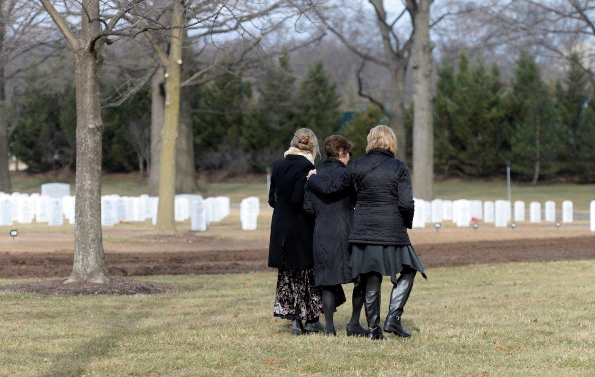 Family and friends pay their final respects to retired Col. Leo Thorsness following his full honors funeral at Arlington National Cemetery, Arlington, Va., Feb. 14, 2018. Thorsness received the Medal of Honor for his heroic actions during the Vietnam War. (U.S. Air Force photo by Staff Sgt. Rusty Frank)