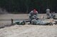 U.S. Air Force Staff Sgt. Timothy Ferraro, 307th Security Forces Squadron combat arms instructor, calls out targets to hit during annual weapons training at Fort Polk, Louisiana, Feb. 9, 2018.