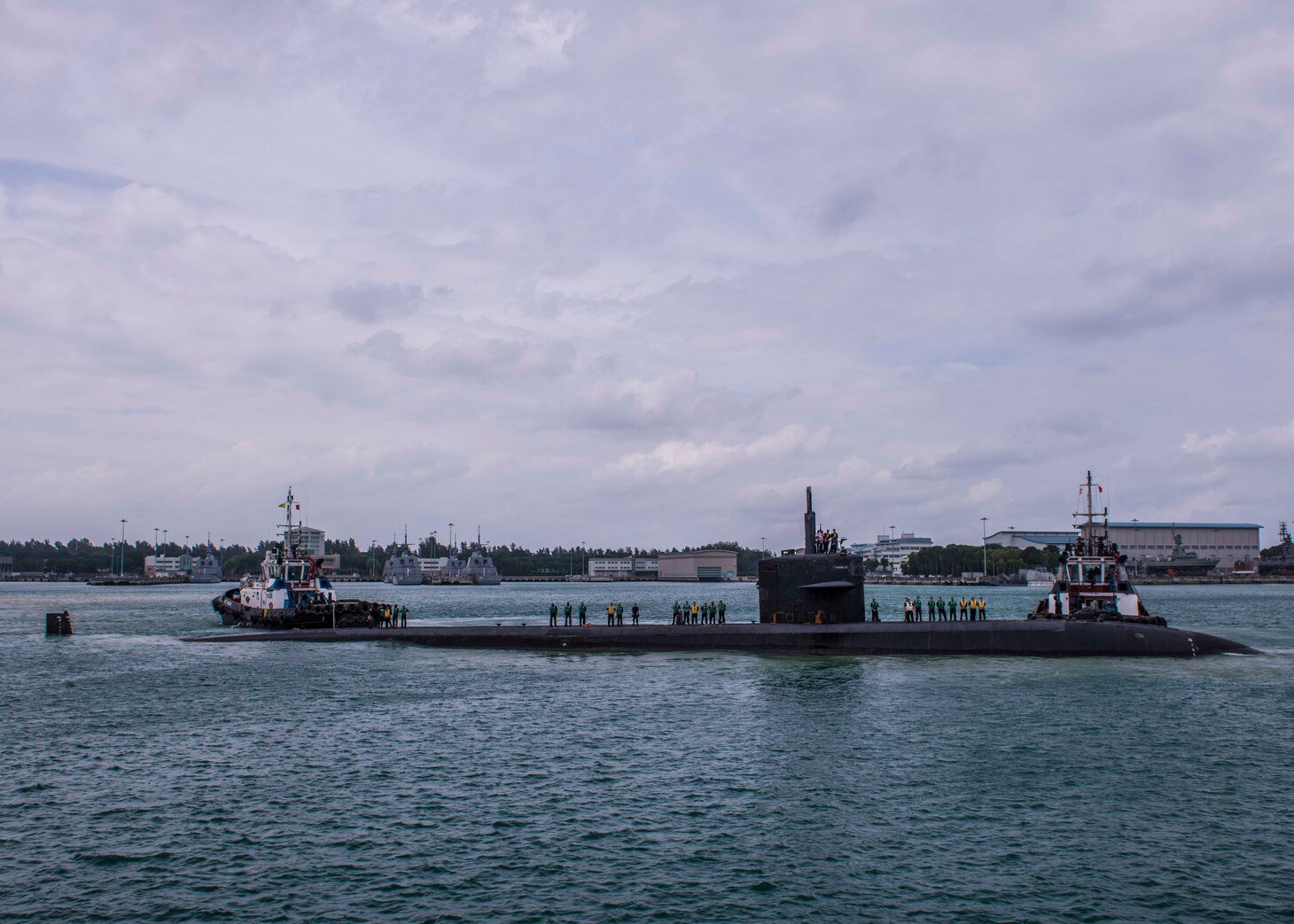 The Los Angeles-class attack submarine USS Bremerton (SSN 698) pulls in to Changi Naval Base, Singapore for a port visit to strengthen partnership and a chance for crew rest. Bremerton is on a regularly scheduled deployment to the Indo-Pacific region.