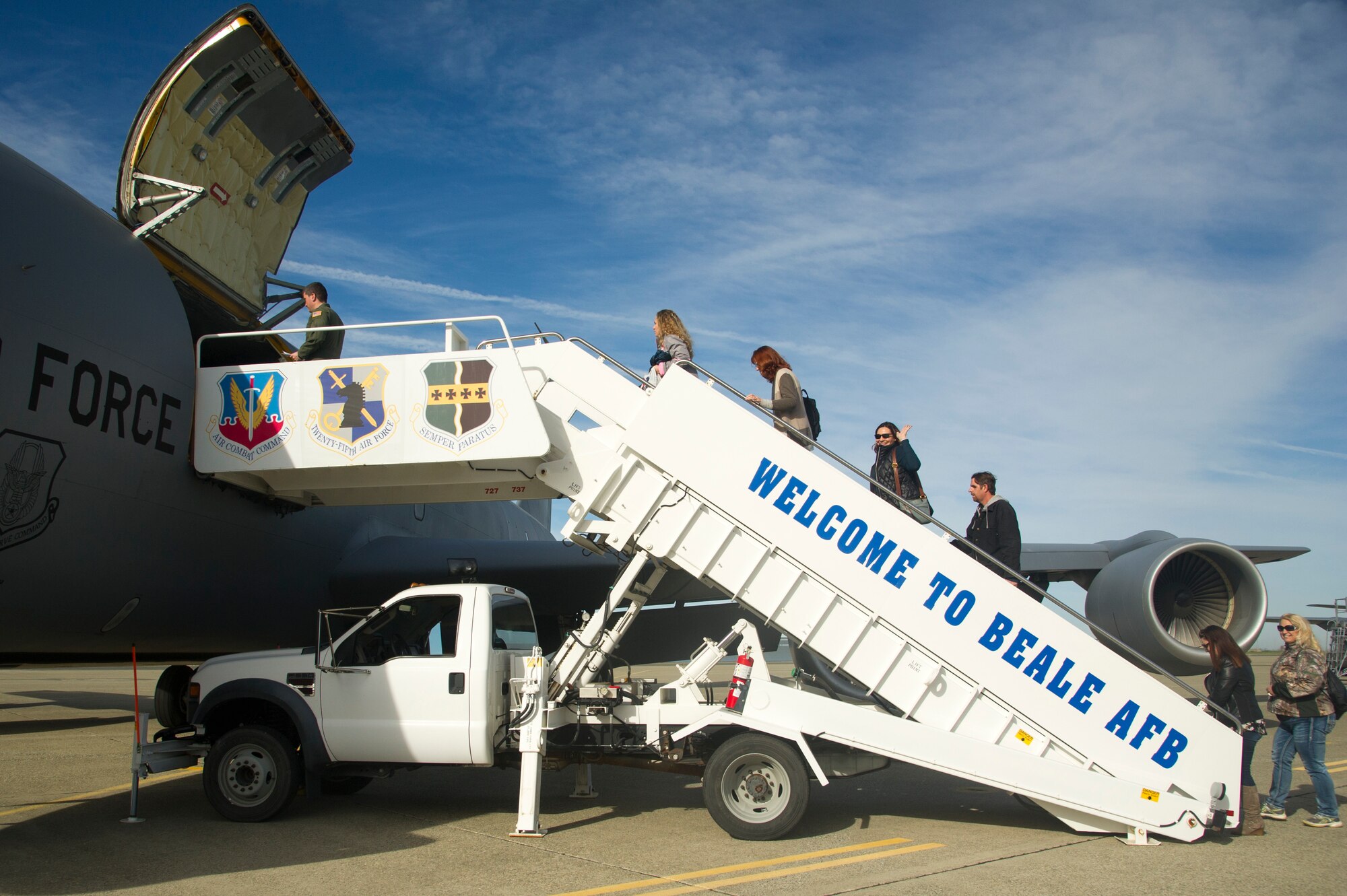 A group of 940th Air Refueling Wing spouses board a KC-135 Stratotanker Feb. 10 at Beale Air Force Base, California.