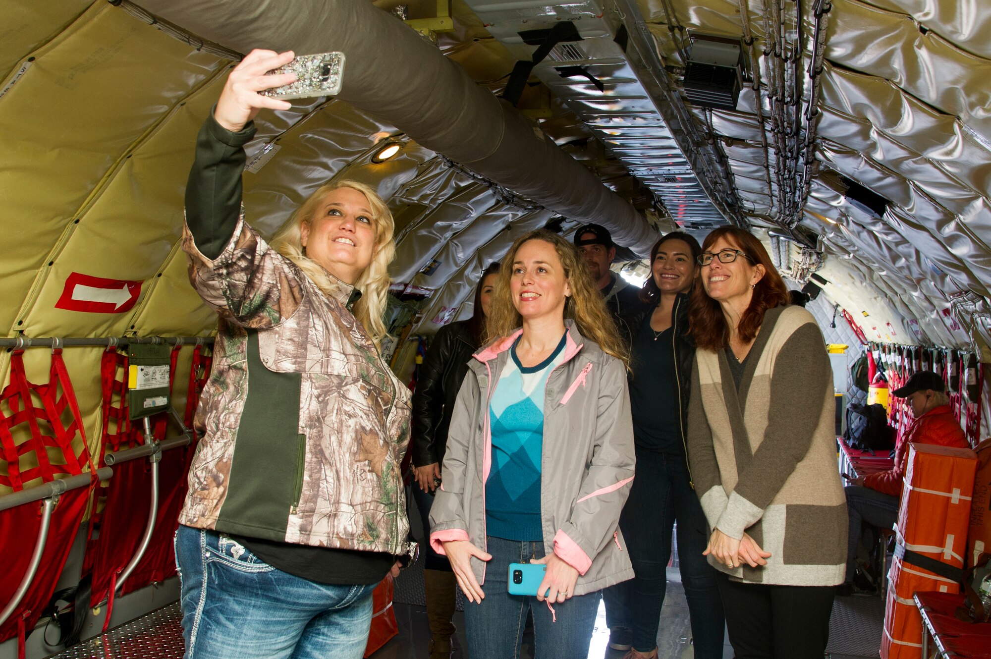 Spouses of 940th Air Refueling Wing members take a selfie on a KC-135 Stratotanker Feb. 10 at Beale Air Force Base, California.