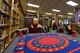 Airman 1st Class Clare Hilborn, 569th United States Force Police Squadron police service personnel, and Senior Airman Rachel Newell, 569th USFPS standards and evaluation personnel, read with children on Feb. 6, 2018 at Vogelweh Elementary School on Vogelweh Military Complex, Germany. Due to the popular demand of this program, volunteers will read with children once per week this year compared to once per month last year.