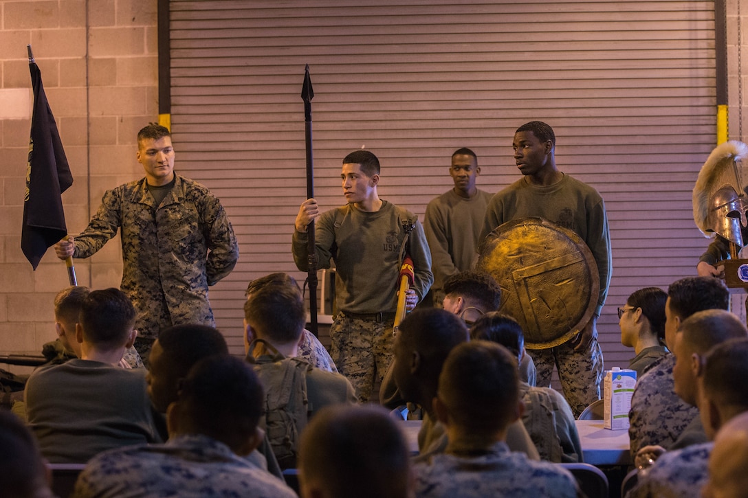 Marines hold trophies after the Spartan Cup competition