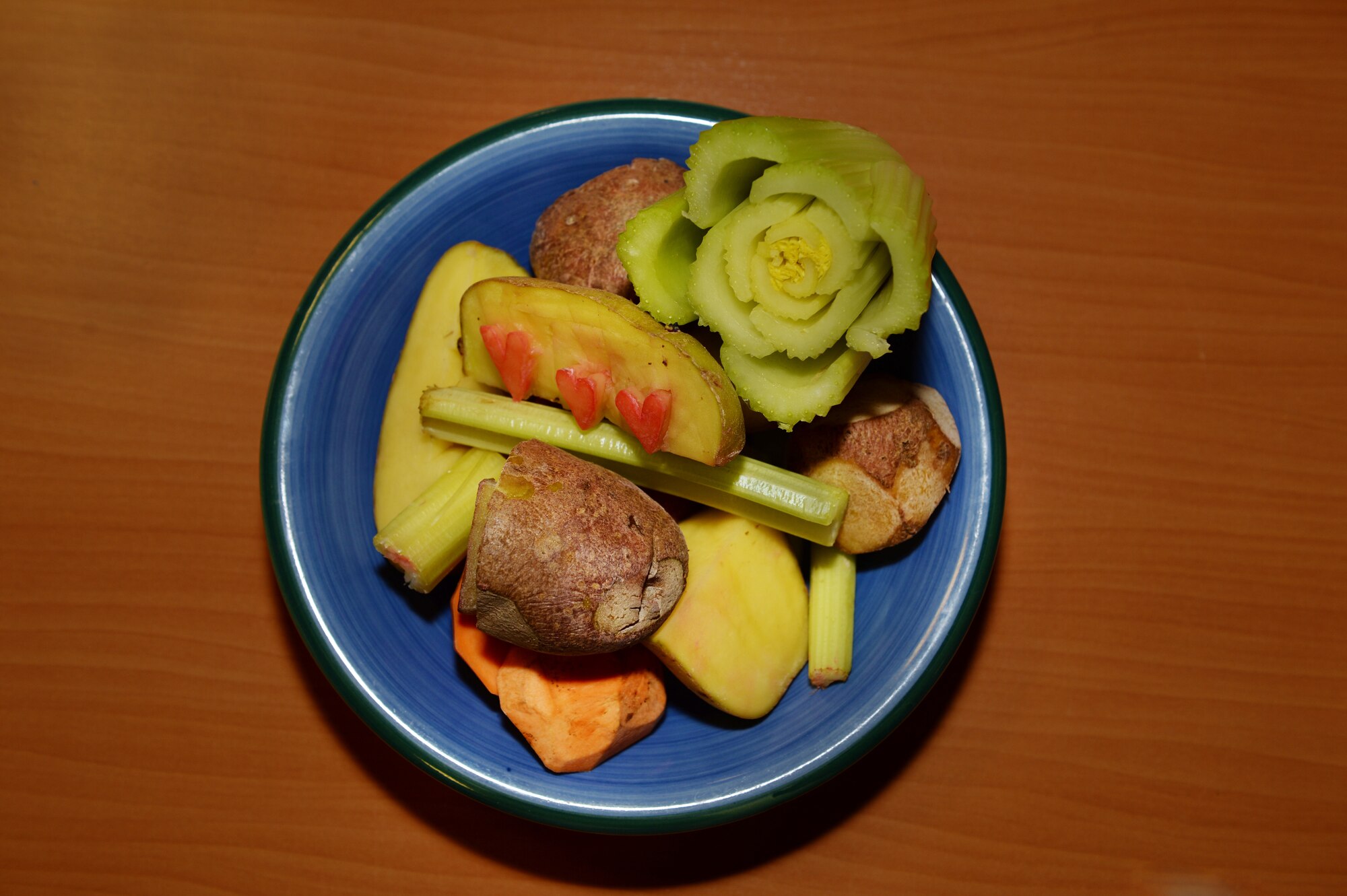 A bowl of vegetables sits on a table at the Fitness and Sports Center Feb. 14, 2018 at Royal Air Force Lakenheath, England. The Women, Infants and Children Overseas program hosted a Veggie Valentines event and staff repurposed the vegetables into stamps for participants to use for art. (U.S. Air Force photo/Airman 1st Class Shanice Williams-Jones)