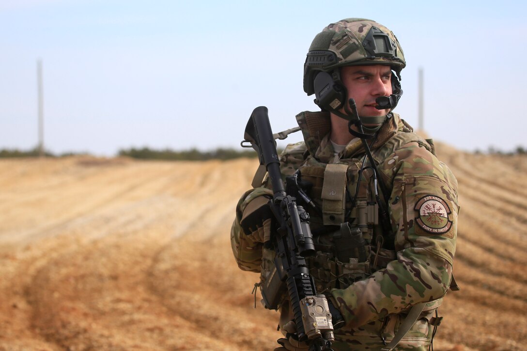 Air Force Staff Sgt. Joshua Derines provides security during a training scenario.