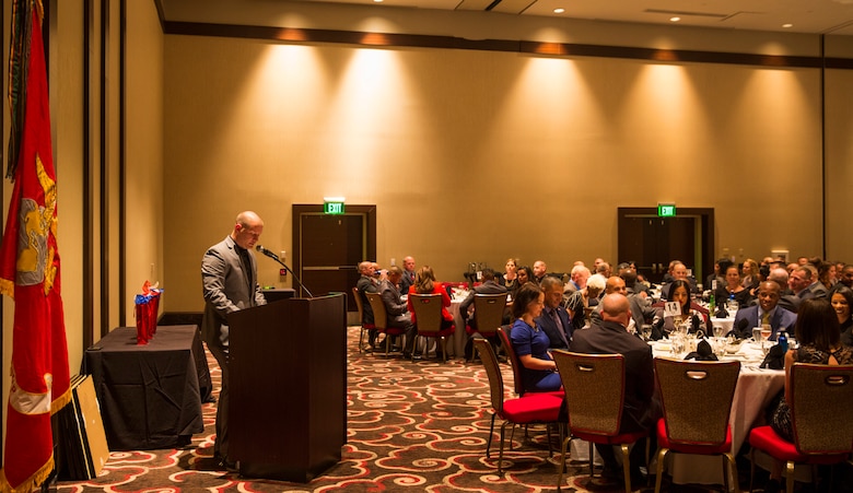1st Sgt. John Miller, first sergeant, Headquarters Company, I Marine Expeditionary Force Information Group, addresses the attendees of the West Coast Senior Enlisted Professional Dinner at Valley Center, Calif., Feb. 8, 2018.
