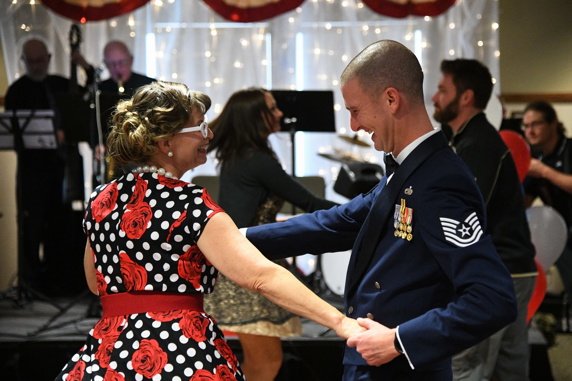 Tech. Sgt. Scott Patteson dances with Julie Hayes, facility recreation director, during a Valentine's Day dance held at the George E. Wahlen Veterans Home in Ogden, Utah, Feb. 14, 2018. (U.S. Air Force photo by R. Nial Bradshaw)