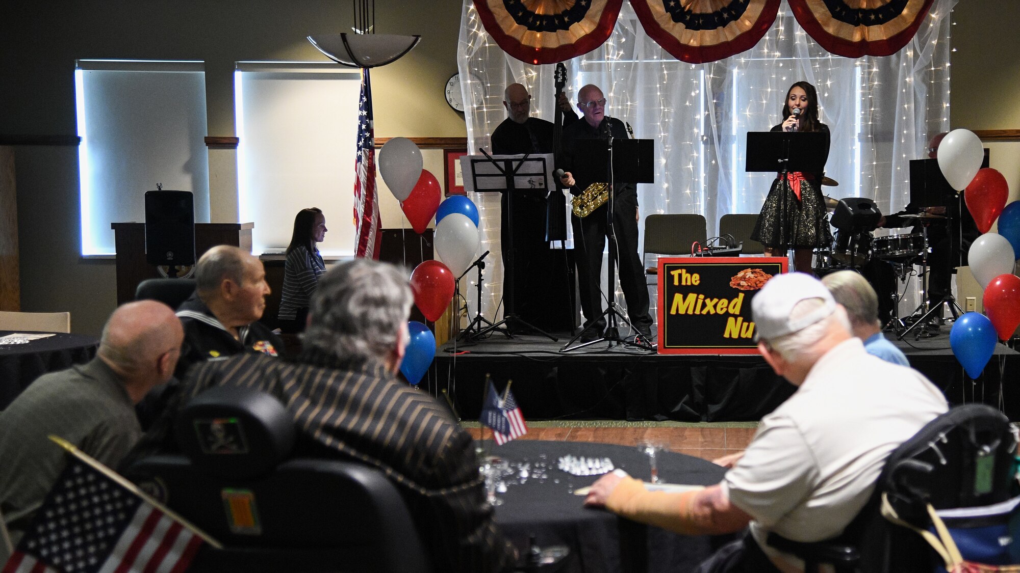 Veterans listen to a band play 40s and 50s music during a Valentine's Day dance held at the George E. Wahlen Veterans Home in Ogden, Utah, Feb. 14, 2018. (U.S. Air Force photo by R. Nial Bradshaw)