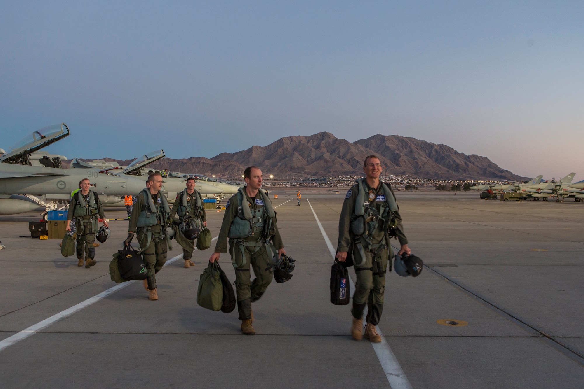 Number 6 Squadron aircrew walk across the flightline at Nellis Air Force Base, Nevada, after transitting from Australia for Exercise Red Flag 18-1. (Courtesy Photo)