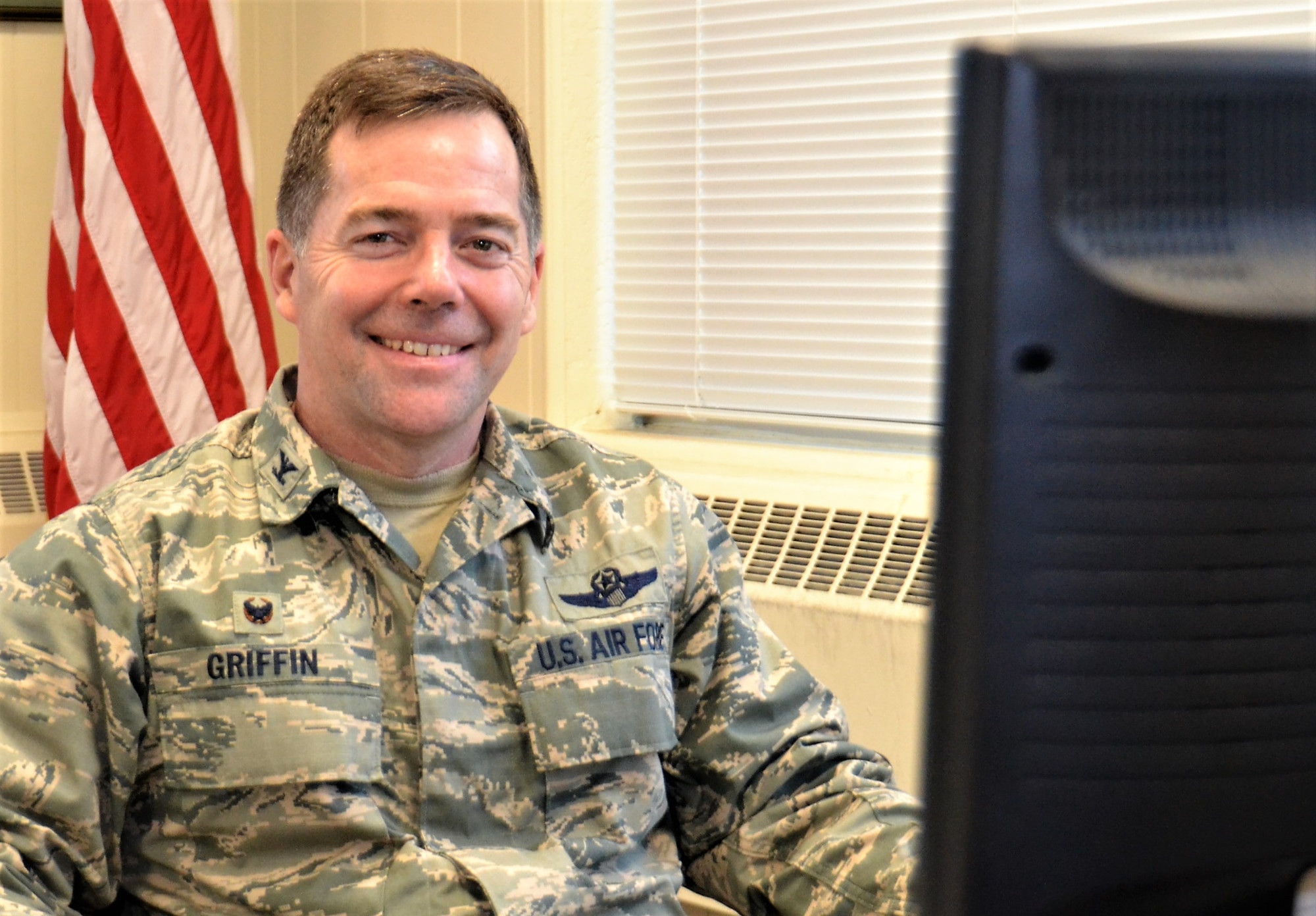 Col. Bill Griffin, 111th Attack Wing commander, takes a moment for a quick photo Feb. 7, 2018. His charge to the 111th ATKW Airmen is to impart trust and loyalty in order to remain ready and resilient. (U.S. Air National Guard photo by Tech. Sgt. Andria Allmond)