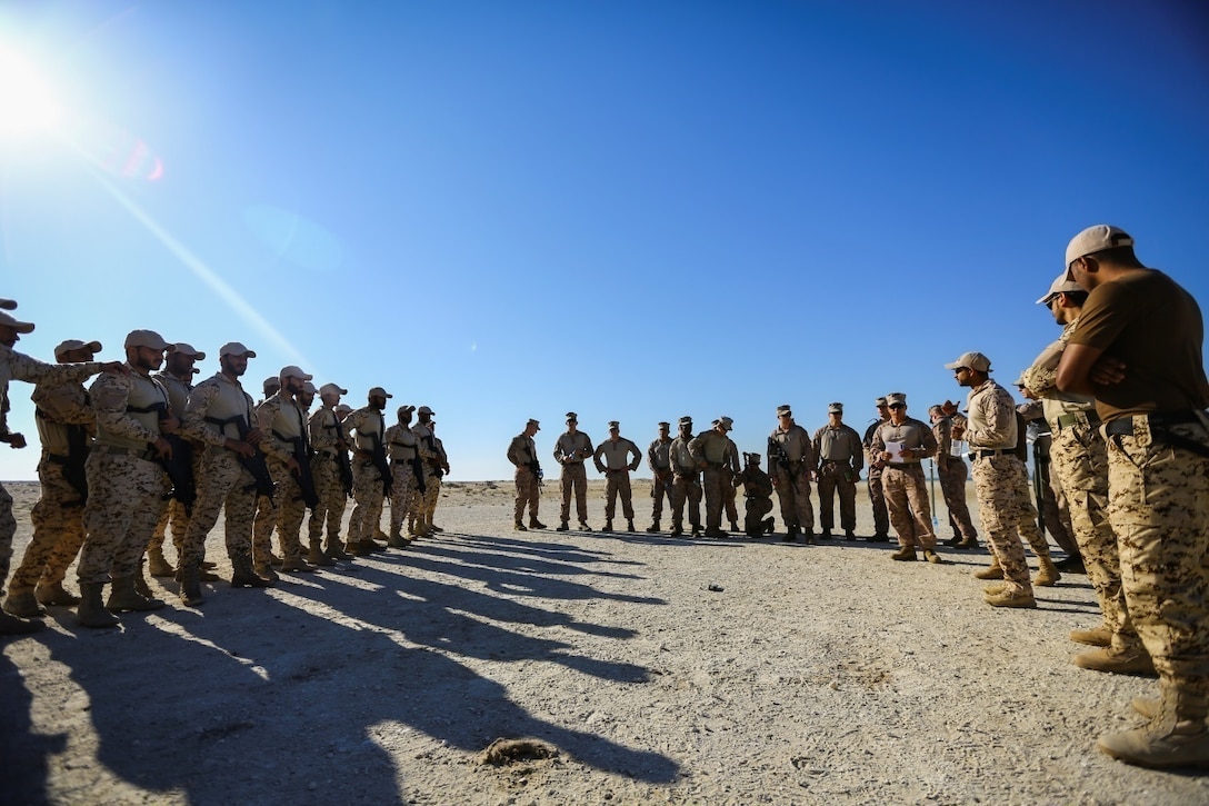 BAHRAIN (Jan. 14, 2018)  A Bahrain Defense Force soldier interprets instructions from U.S. Marines attached to Fleet Anti-terrorism Security Team, Central Command, a subordinate command of Naval Amphibious Force, Task Force 51, 5th Marine Expeditionary Brigade – TF 51/5, prior to conducting close quarters battle training. TF 51/5 staff frequently participates in subject matter expert exchange opportunities with partner nations to share expertise in respective fields and build upon partner nation capabilities in order to increase regional stability and improve interoperability. (U.S. Marine Corps photo by Sgt. Wesley Timm/Released)