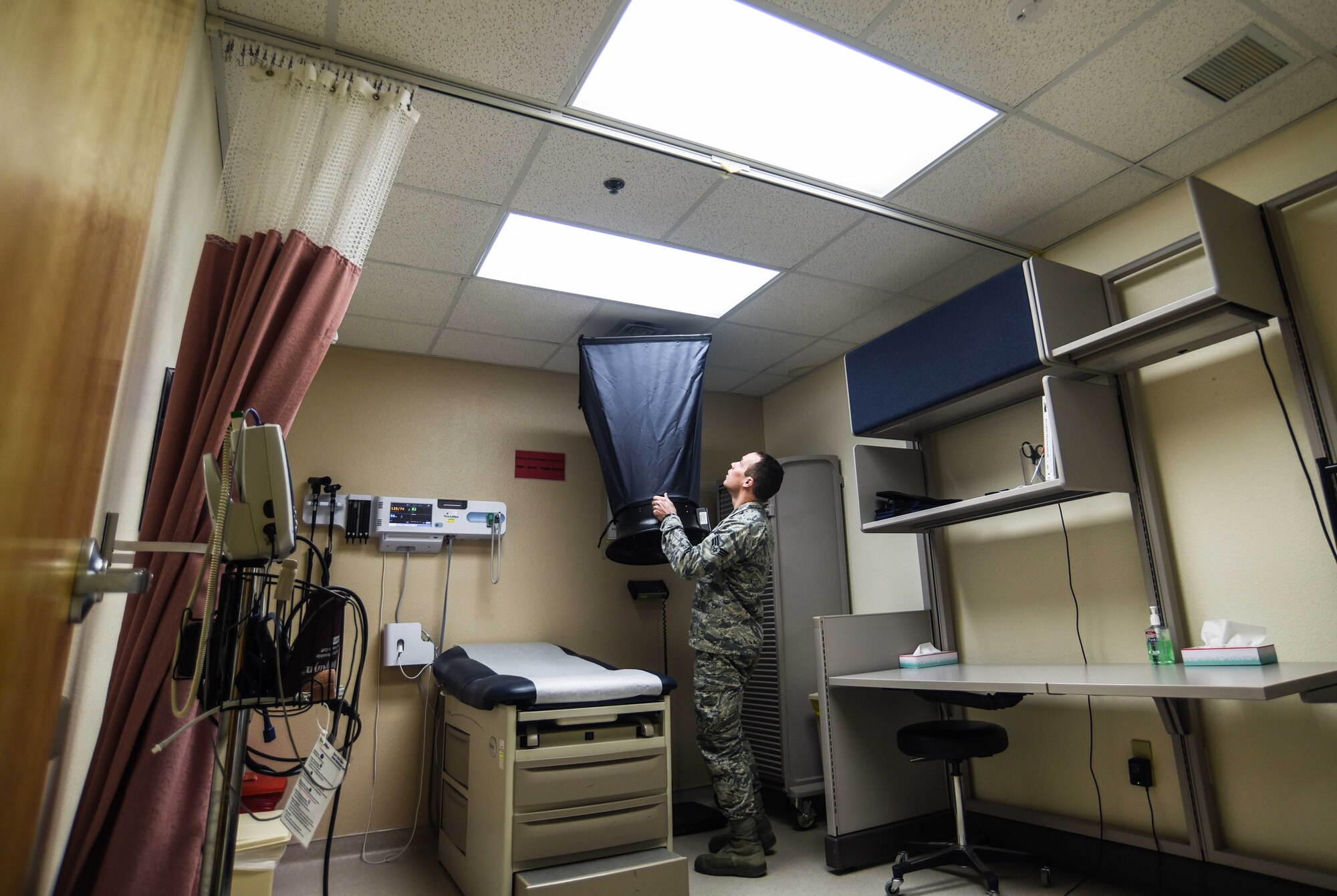 Senior Airmen James Bryant, 90th Medical Group bioenvironmental engineering technician, measures the air flow inside the Medical Clinic Feb. 8, 2018 at F.E. Warren Air Force Base, Wyo. Due to the clinic having a high traffic volume of patients with illnesses, it is important that there is proper airflow within the building to ensure there is a continuous flow of fresh air.