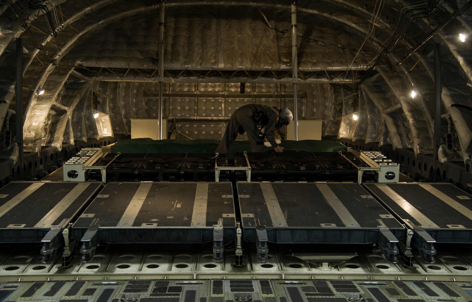 Airman 1st Class Steven Slover, 535th Airlift Squadron loadmaster, goes through his preflight checklist aboard a C-17 at Joint Base Pearl Harbor-Hickam, Hawaii, Feb. 9, 2018. Aircrew and maintainers are training in support of the 15th Wing’s “Age of Readiness,” a wing-wide initiative to maintain professional readiness. (U.S. Air Force photo by Tech. Sgt. Heather Redman)