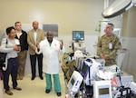 Army Col. Booker King explains the life-saving advances provided by the adult extracorporeal membrane oxygenation, or ECMO, program to federal participants in the Leadership Federal Executive Board during a tour of the San Antonio Military Medical Center Feb. 14 in San Antonio. The tour was part of a health care services day organized by the LFEB that included additional medical facilities to develop a better understanding of federal community. The LFEB is made up of 45 class members from various federal agencies across San Antonio who meet monthly to learn from key decision-makers in both the public and private sectors. SAMMC received national recognition in 2017 for its ECMO program, which is a heart-lung bypass system used in the treatment of affected organs. King is a surgeon assigned to SAMMC.