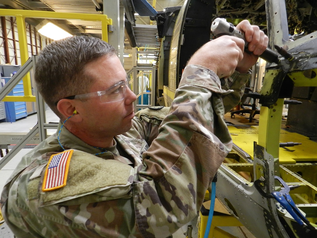 Hardware like the wedge CLECOS being installed is procured through the contracting work done by the CCAD IPV team at Troop Support.