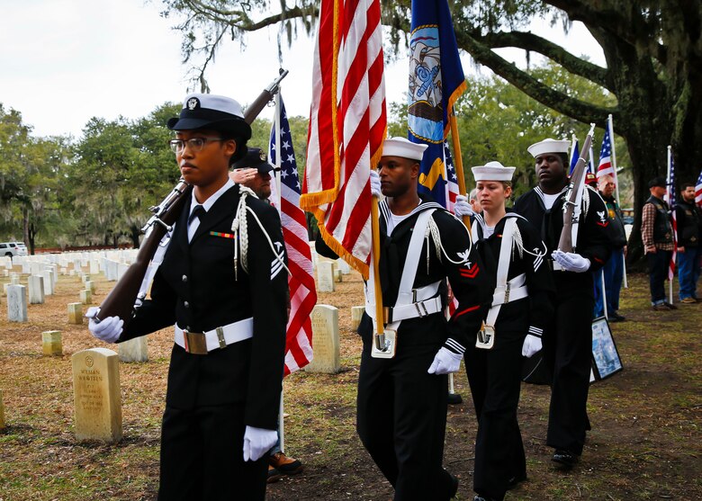 The Color Guard marches on the colors during a headstone unveiling at the Beaufort National Cemetery, Feb. 10.
