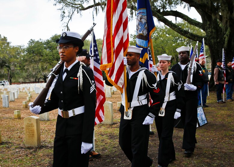 The Color Guard marches on the colors during a headstone unveiling at the Beaufort National Cemetery, Feb. 10.