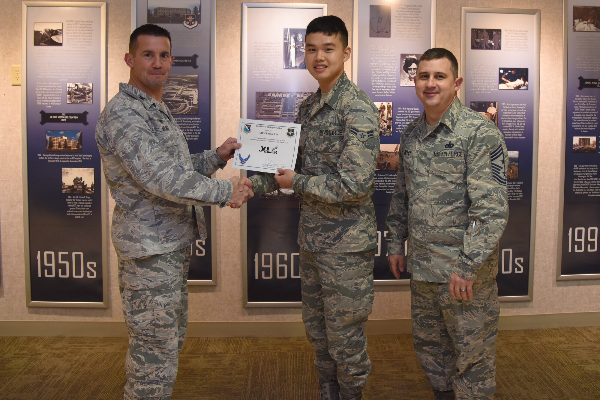 Airman 1st Class Chansol Kim, 47th Medical Support Squadron referral management technician, was chosen by wing leadership to be the “XLer” of the week, for the week of Feb. 12, 2018. The “XLer” award, presented by Col. Charlie Velino, 47th Flying Training Wing commander, is given to those who consistently make outstanding contributions to their unit and the Laughlin mission. (U.S. Air Force photo/Airman 1st Class Marco A. Gomez)