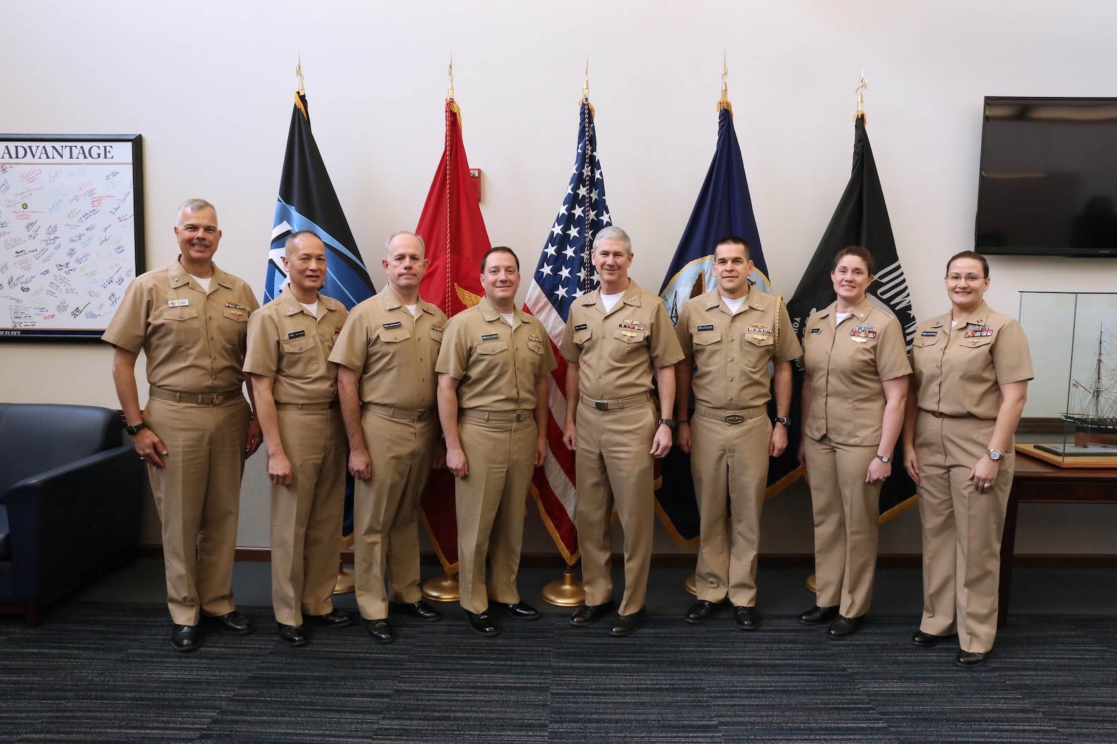Naval Sea Systems Command (NAVSEA) Commander Vice Adm. Tom Moore (center) with the first group of Navy officers to wear the Engineering Duty Officer (EDO) qualification insignia Jan. 8, 2018 at the Washington Navy Yard.