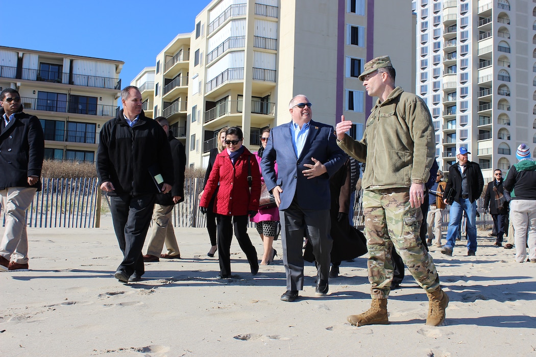 U.S. Army Corps of Engineers, Baltimore District Commander Col. Ed Chamberlayne walks and talks with Maryland Governor Larry Hogan and Maryland Secretary of Natural Resources Mark Belton while visiting ongoing beach renourishment activities in Ocean City, Maryland Nov. 20, 2017. The work is part of the coastal storm risk management project that reduces risks to Ocean City and is a cost-sharing partnership between the U.S. Army Corps of Engineers and the state of Maryland, as well as Worcester County and the Town of Ocean City. (U.S. Army photo by Becca Nappi)