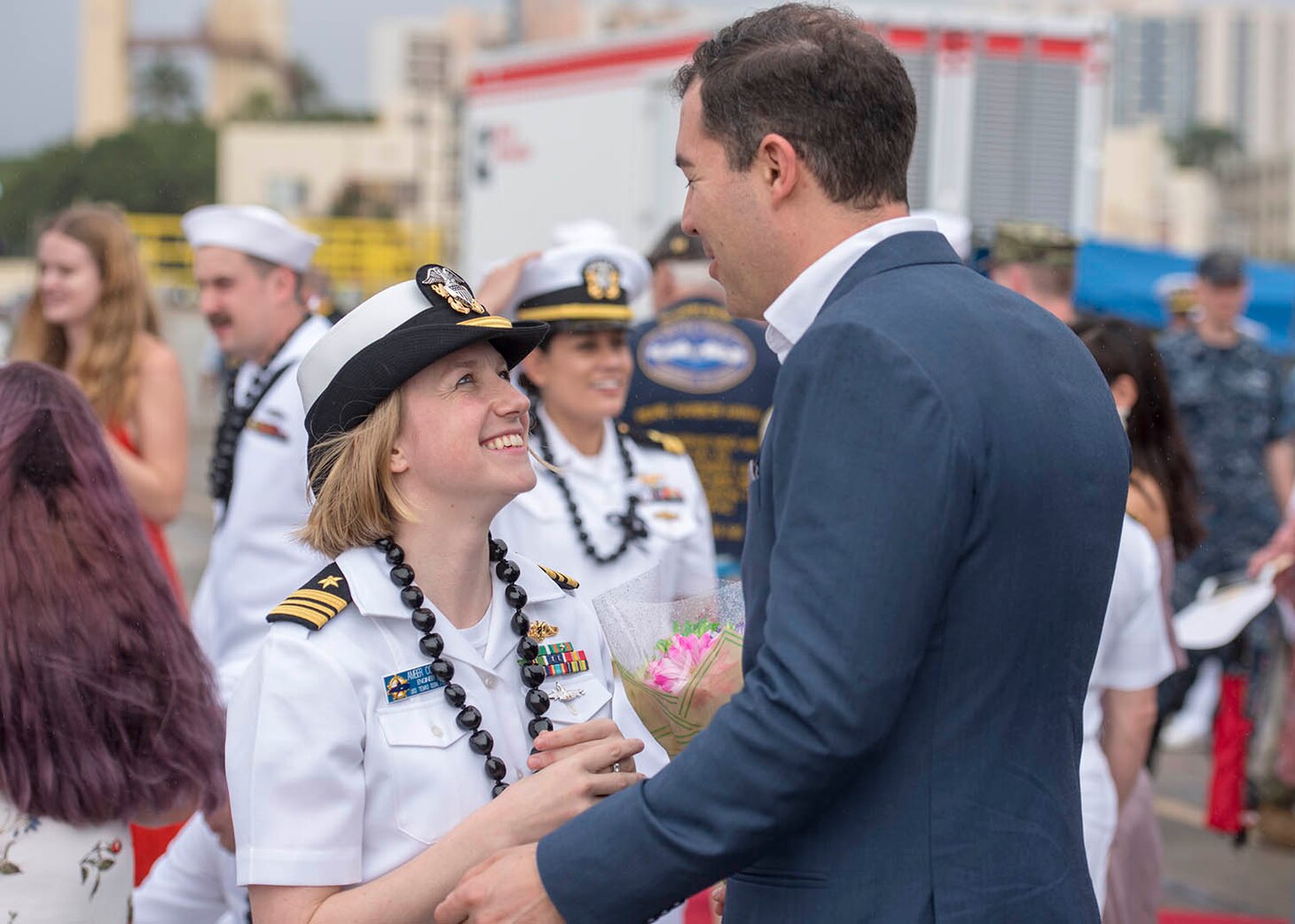 Lt. Cmdr. Amber Cowan, assigned to the Virginia-class fast-attack submarine USS Texas (SSN 775) and native of Colorado Springs, Colorado, greets her husband on the submarine pier in Joint Base Pearl Harbor-Hickam, Feb. 14.