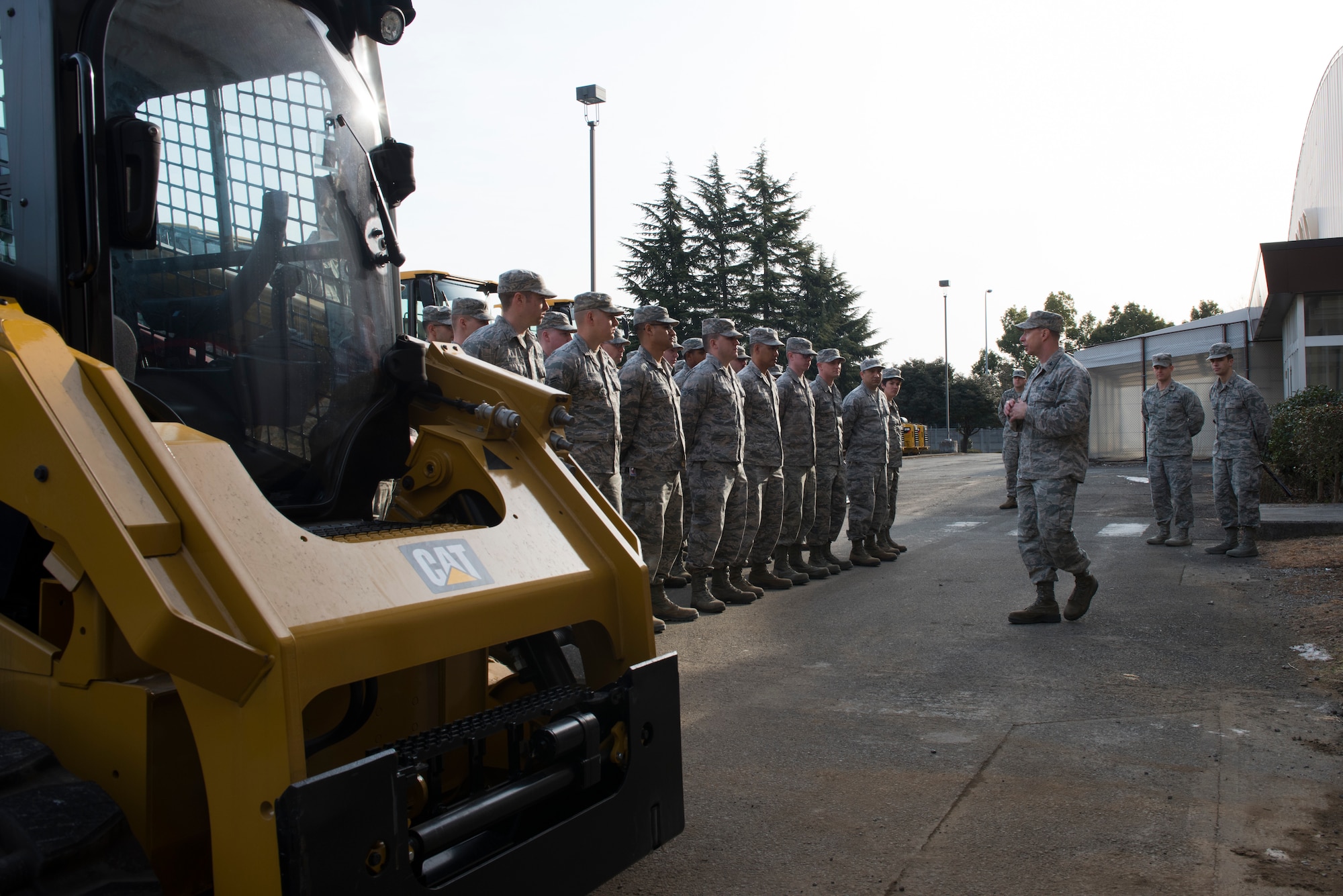 Col. John Winkler, 374th Mission Support Group commander, addresses Airmen from the 374th Civil Engineer Squadron during the ribbon cutting ceremony for the war reserve materiel storage warehouse at Yokota Air Base, Japan, Feb. 15, 2018.