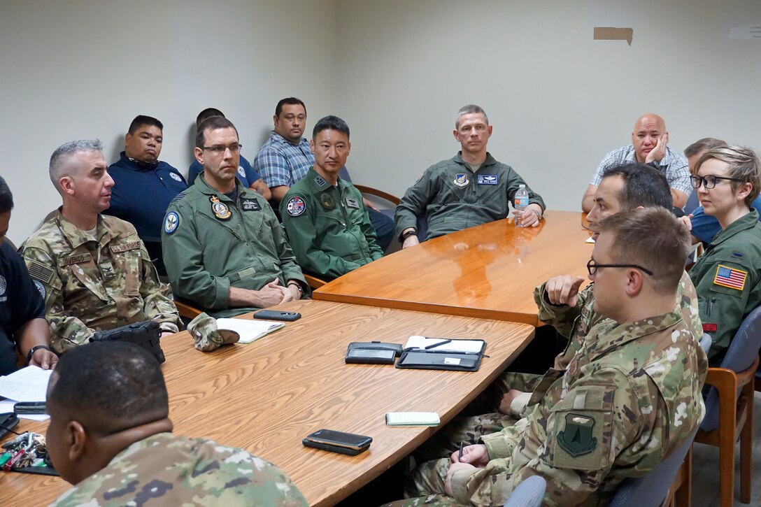 U.S. Air Force (USAF) Lt. Col. Jeremiah Castillo, 36th Mobility Response Squadron USAF director of operations, discusses humanitarian assistance/disaster relief (HA/DR) training with three COPE NORTH 2018 exercise directors and Saipan civil leaders and airport officials, Feb. 13. This year's COPE NORTH is an annual Pacific Air Forces tri-lateral HA/DR exercise with participants from the USAF, U.S. Navy, U.S. Marine Corps, Koku Jieitai (Japan Air Self-Defense Force), and Royal Australian Air Force. COPE NORTH is a model opportunity for expanding engagements with the Commonwealth of the Northern Mariana Islands.(U.S. Air Force photo by Capt. James Moore)