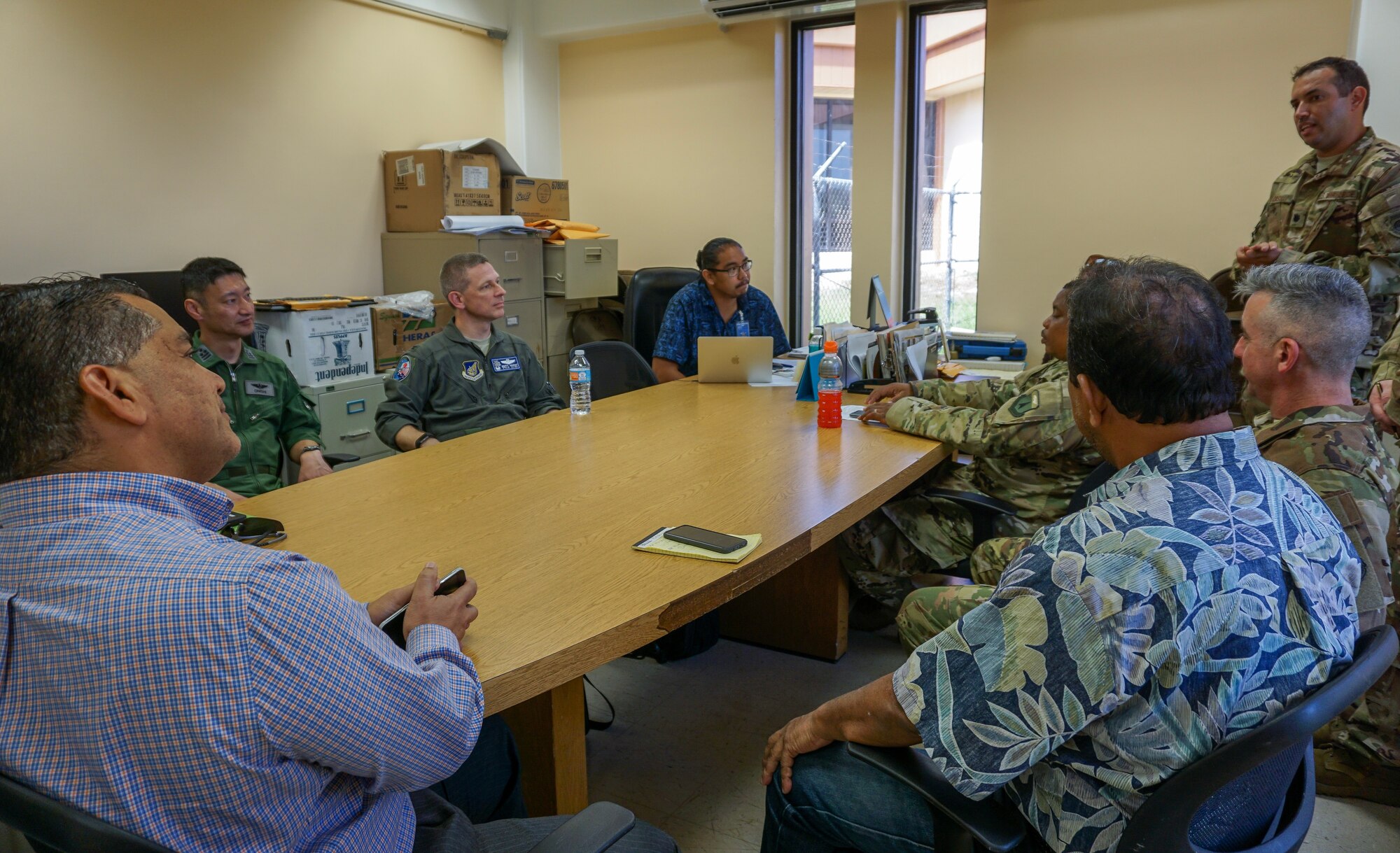 U.S. Air Force (USAF) Lt. Col. Jeremiah Castillo, 36th Mobility Response Squadron USAF director of operations, discusses humanitarian assistance/disaster relief (HA/DR) training with three COPE NORTH 2018 exercise directors and Tinian civil leaders and airport officials, Feb. 13. This year's COPE NORTH is an annual Pacific Air Forces tri-lateral HA/DR exercise with participants from the USAF, U.S. Navy, U.S. Marine Corps, Koku Jieitai (Japan Air Self-Defense Force), and Royal Australian Air Force. COPE NORTH is a model opportunity for expanding engagements with the Commonwealth of the Northern Mariana Islands.(U.S. Air Force photo by Capt. James Moore)