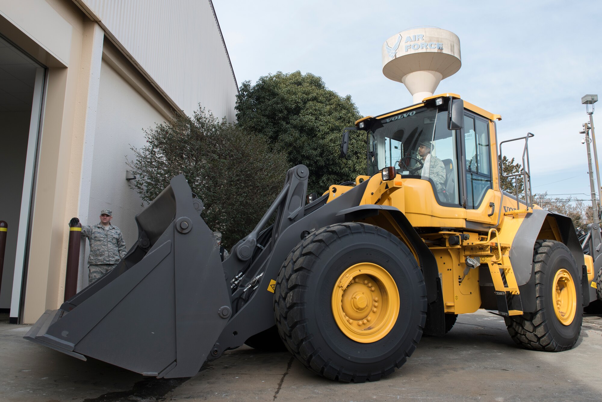 An Airman from the 374th Civil Engineer Squadron maneuvers airfield damage repair equipment into the newly opened war reserve materiel storage warehouse at Yokota Air Base, Japan, Feb. 15, 2018.