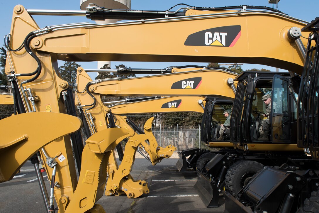 Airmen from the 374th Civil Engineer Squadron prepare to move airfield damage repair equipment into the newly opened war reserve materiel storage warehouse at Yokota Air Base, Japan, Feb. 15, 2018.