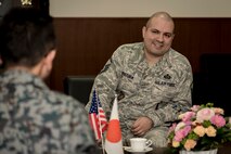 U.S. Air Force Master Sgt. Cesar Ventura, right, a 35th Fighter Wing inspector general vertical inspections planner, and Japan Air Self-Defense Force Warrant Officer Tsuyoshi Endo, right, the former 6th Air Defense Missile Group chief and Senior Noncommissioned Officer Association president, exchange mutual thanks for Ventura's many years of service to JASDF in the 3rd Air Wing's headquarters at Misawa Air Base, Japan, Feb. 14, 2018. "Vinny-san" as Endo refers to Ventura by, submitted him for his service's Special Class Award and on Dec. 13, 2017, JASDF Warrant Officer Junji Miura, the 3rd Air Wing command chief, presented the award on behalf of the Area Defense Command in Tokyo. (U.S. Air Force photo by Tech. Sgt. Benjamin W. Stratton)