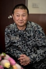 Japan Air Self-Defense Force Warrant Officer Junji Miura, the 3rd Air Wing command chief, smirks as he discusses his friend's, JASDF Warrant Officer Tsuyoshi Endo, the former 6th Air Defense Missile Group chief and Senior Noncommissioned Officer Association president, retirement plans with U.S. Air Force Master Sgt. Cesar Ventura, a 35th Fighter Wing inspector general vertical inspections planner, at Misawa Air Base, Japan, Feb. 14, 2018. Over the past four years, Ventura worked with Miura and Endo planning and organizing bilateral events including dining outs and tug-of-war competitions. His mastery of their culture and language helped him grow so close with the two warrants that now they call him, "like family." (U.S. Air Force photo by Tech. Sgt. Benjamin W. Stratton)