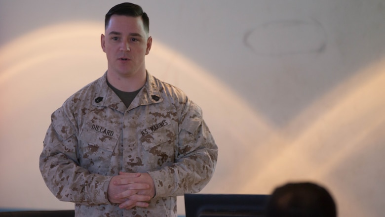 Gunnery Sgt. Brandon Dillard, Marine Air-Ground Task Force deployment distribution operations center chief, Command Element, Special Purpose Marine Air-Ground Task Force – Crisis Response – Central Command, introduces himself to Kuwaiti Marines from the Kuwaiti Marine Battalion during a Tactical Resupply Subject Matter Expert Exchange. Participants exchanged logistic concepts and best practices to learn from each other and strengthen relationships.