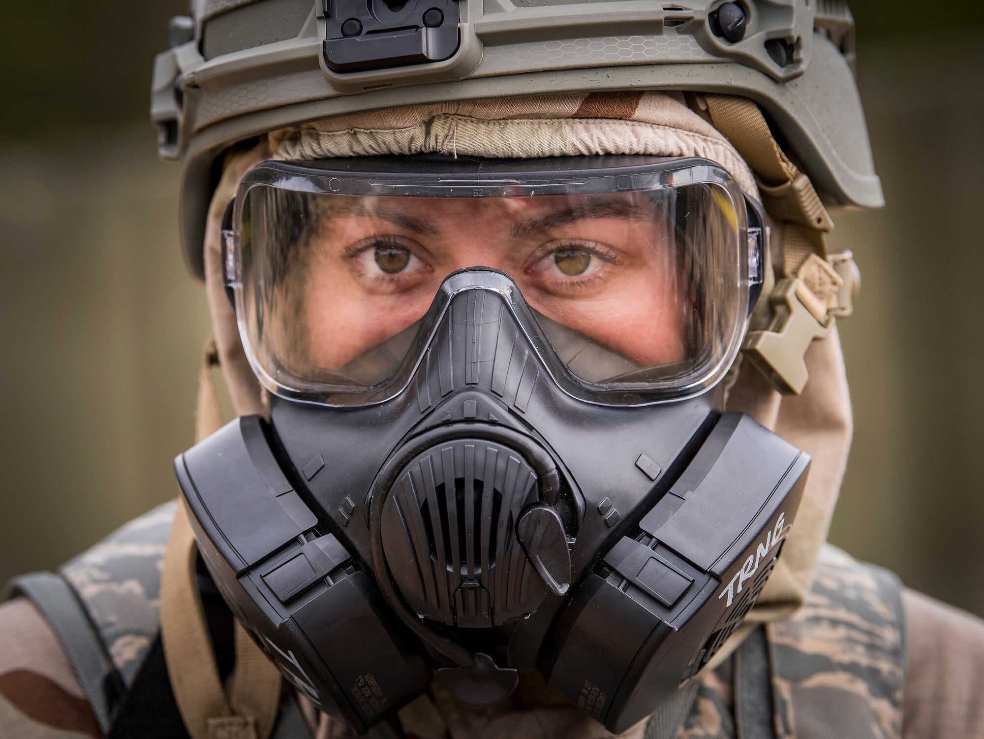 Airman Amanda Danforth, 96th Security Forces Squadron, watches the horizon during an alarm phase of a chemical, biological, radiological, nuclear and explosive training exercise at Eglin Air Force Base, Fla., Feb. 1, 2018. (U.S. Air Force photo by Samuel King Jr.)
